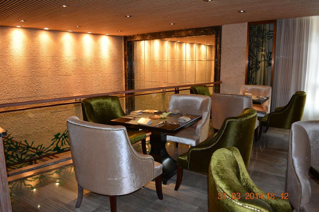 Mareka Haihe International Hotel Xichang Buitenkant foto